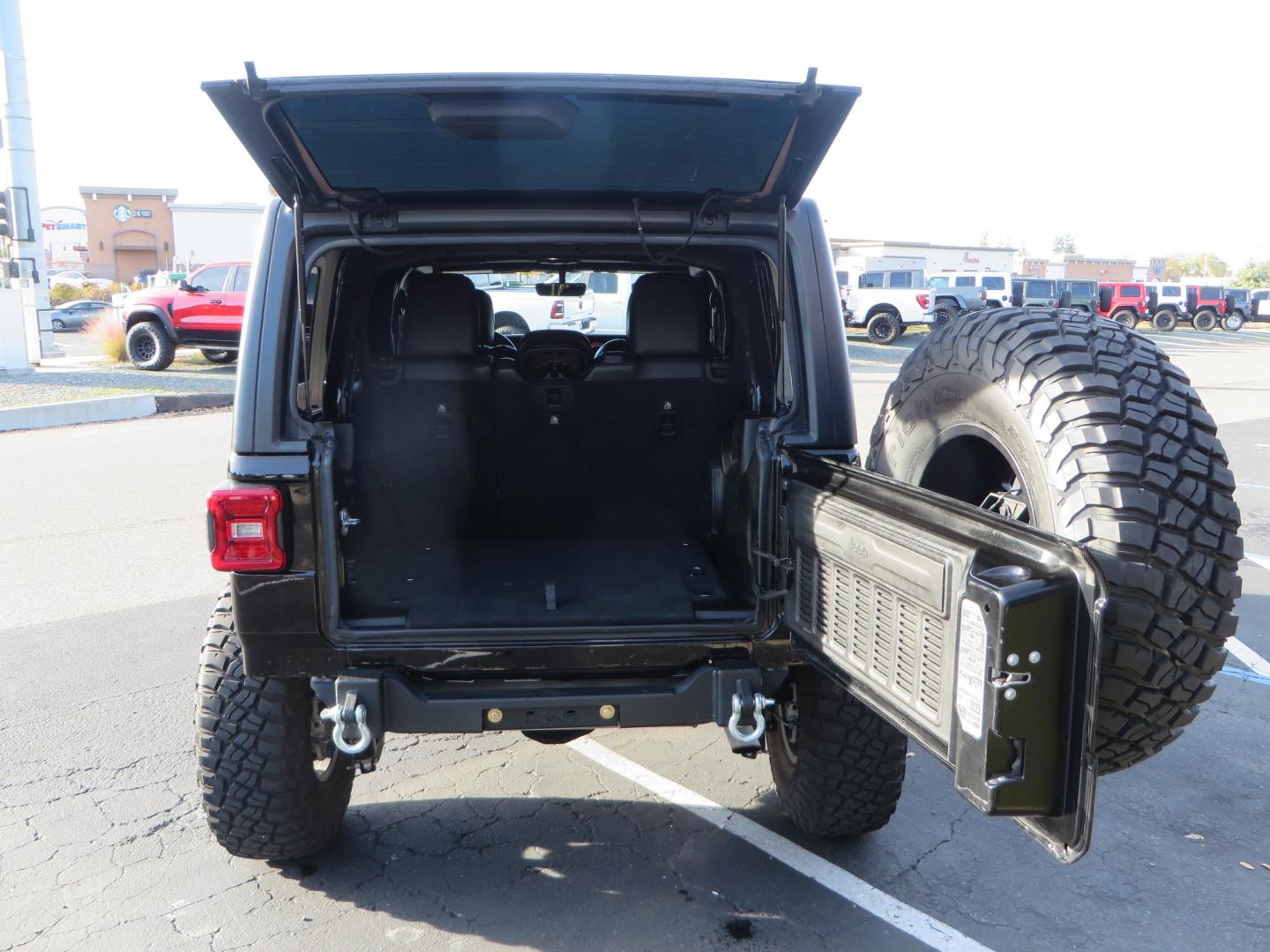 2018 BLACK /BLACK Jeep Wrangler JL Unlimited Rubicon (1C4HJXFG0JW) with an 3.6L V6 DOHC 24V engine, automatic transmission, located at 2630 Grass Valley Highway, Auburn, CA, 95603, (530) 508-5100, 38.937893, -121.095482 - JL Rubicon sitting on Teralfex suspension, Falken fast adjust shocks, Method wheels, BFG KM3 tires, Smittybilt winch, Rigid Leds, window tint, RC Fender eliminators, DV8 rear bumper, Smittybilt HD hinge kit, and a terflex spare tire relocation. - Photo#62